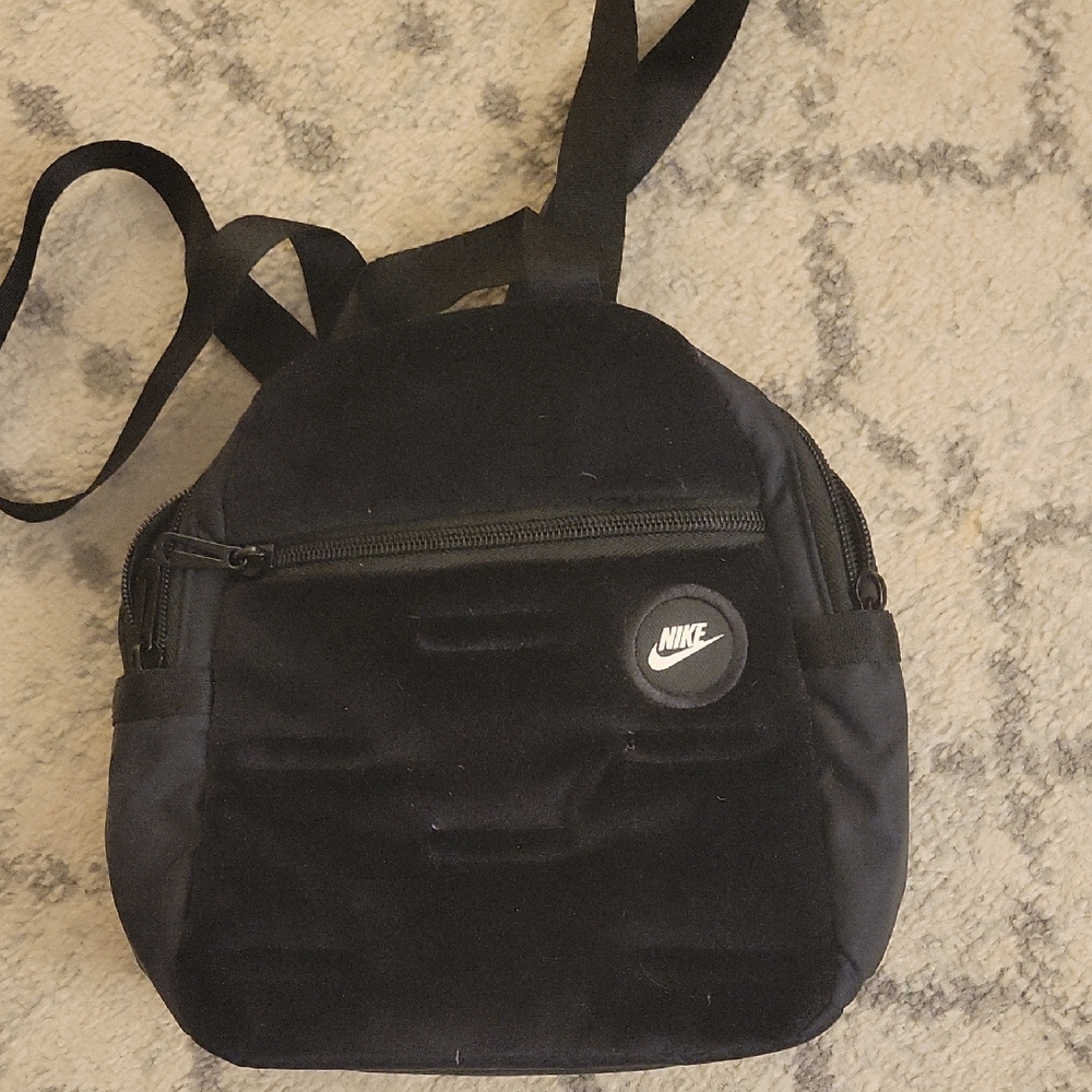 Nike Black Compact Backpack. Womens. Approx 10inches X 10inches.